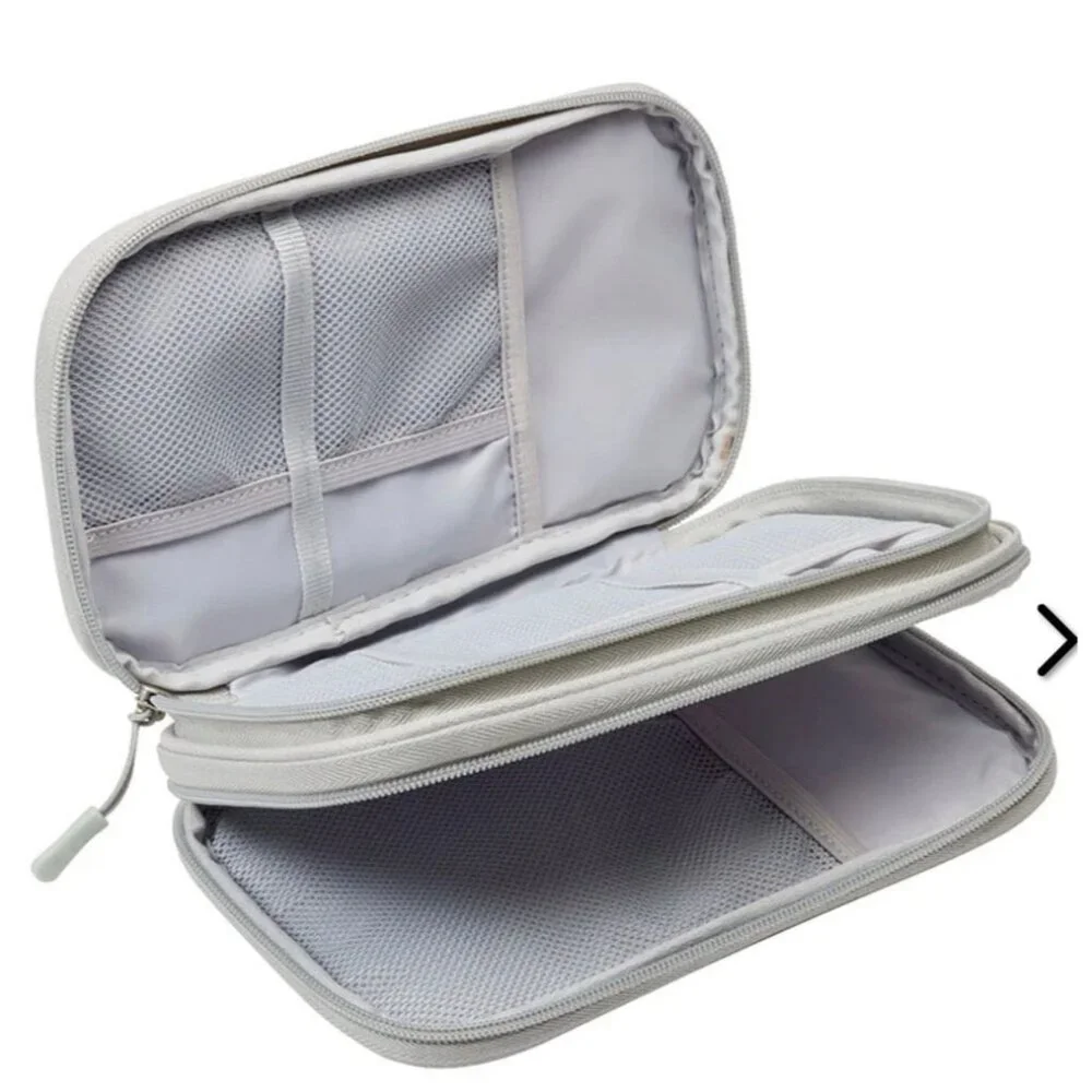 Multi-compartment organizer used for travel, electronic accessories, school supp